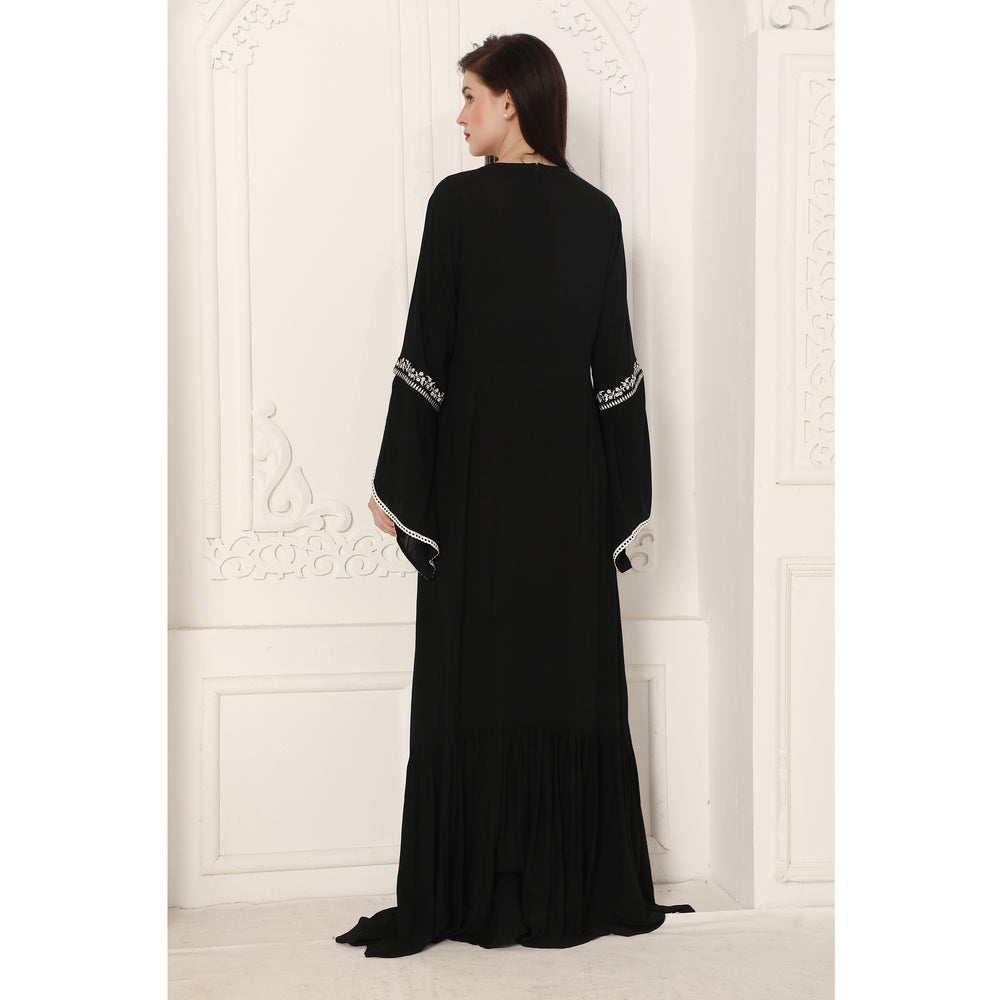 
                  
                    Black Designer Gown with White Floral Embroidery Big Flair Sleeves
                  
                