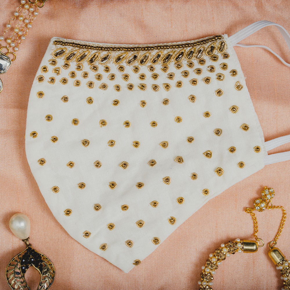 
                  
                    Creamy White Cotton Face Mask with Golden Embroidery - Maxim Creation
                  
                