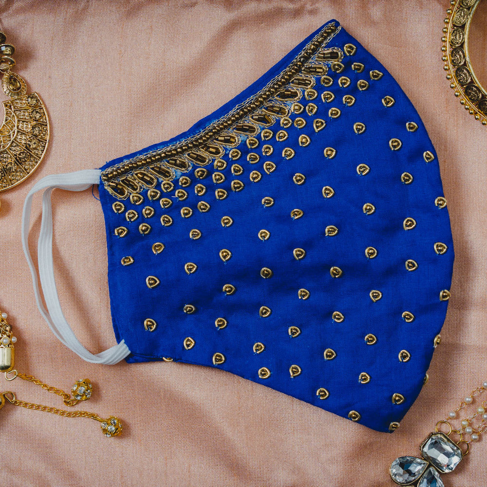 
                  
                    Gold Embroidery on Royal Blue Cotton Mask - Maxim Creation
                  
                