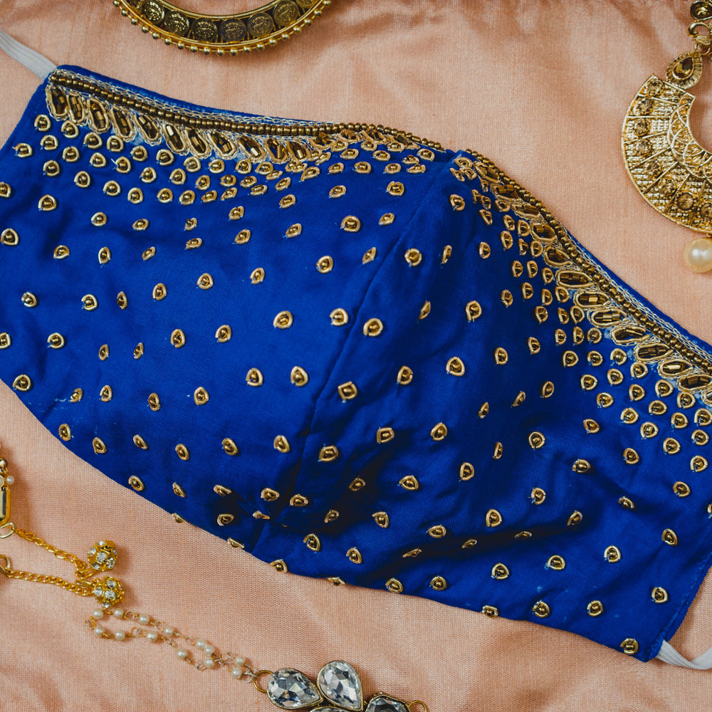 
                  
                    Gold Embroidery on Royal Blue Cotton Mask - Maxim Creation
                  
                