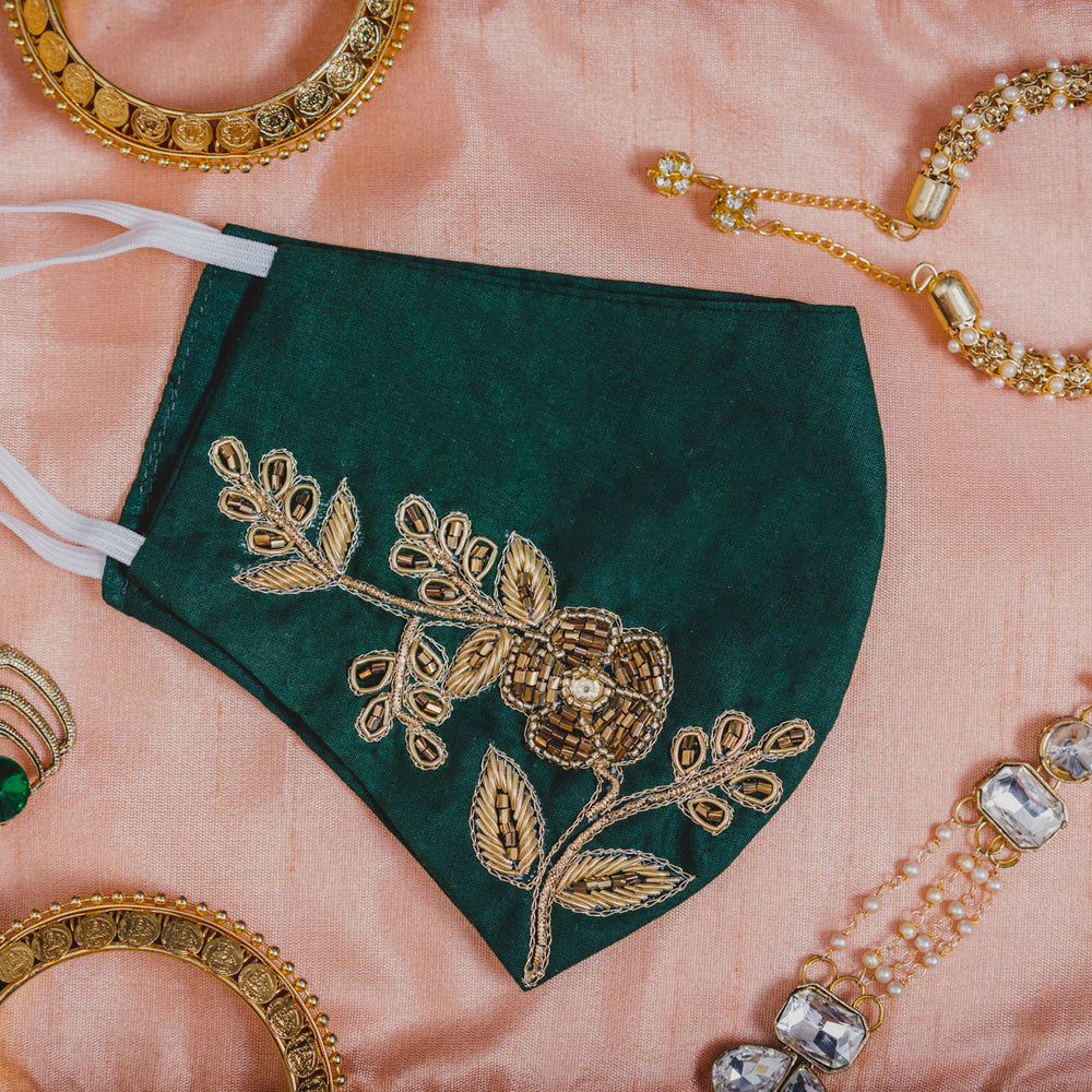 
                  
                    Leaf Textured Embroidery on Bottle Green Coloured Cotton Face Mask - Maxim Creation
                  
                