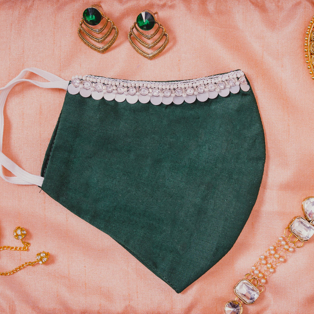 
                  
                    Bottle Green Coloured Cotton Face Mask with Hanging Tassel Embroidery - Maxim Creation
                  
                